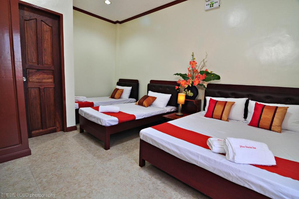 Jilian Tourist Inn Puerto Princesa Habitación foto